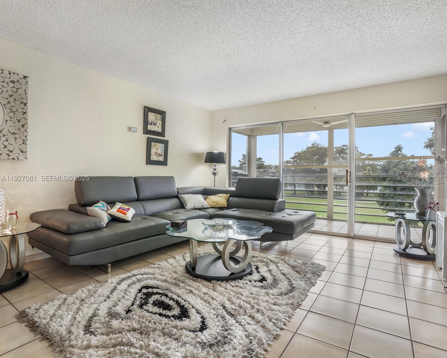 1ad5be0d-1498 8320 Sands Point Blvd # M301, Tamarac FL 33321 — #A11927081