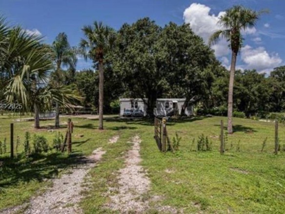 2638 ORTONA LOCKS RD, Moore Haven FL 33471 — #A11928947