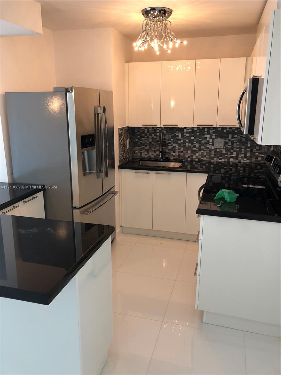 1ad5be0d-1602 3755 NE 167th St # 37, North Miami Beach FL 33160 — #A11713689
