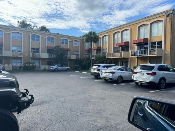 18101 NW 68th Ave # D207, Hialeah FL 33015 — #A11892284