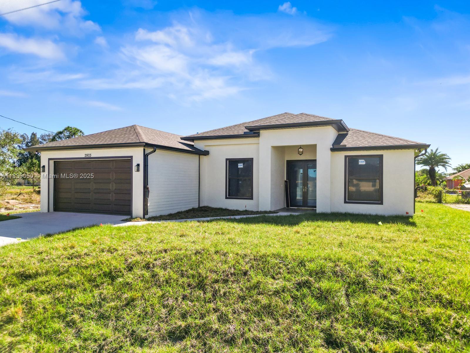 1ad5be0d-2044 2803 44TH ST SW, Lehigh Acres FL 33976 — #A11839050