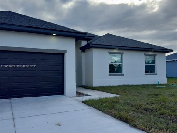 748 748 CHESTNUT ST E, Lehigh Acres FL 33974 — #A11932662