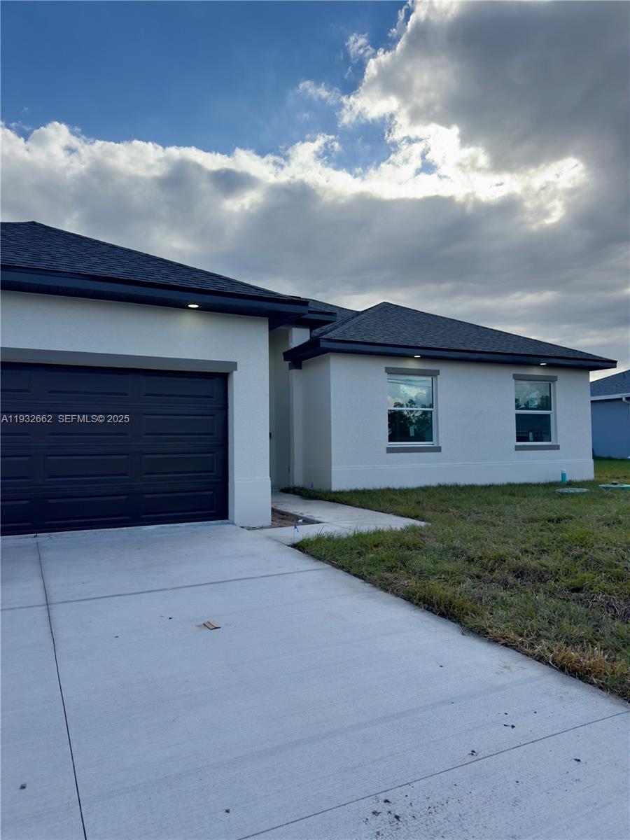 748 748 CHESTNUT ST E, Lehigh Acres FL 33974 — #A11932662