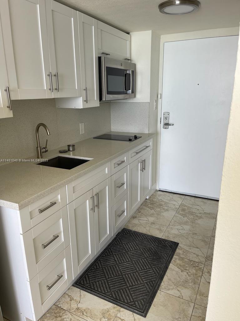 1ad5be0d-2850 19201 Collins Ave # 411, Sunny Isles Beach FL 33160 — #A11481540