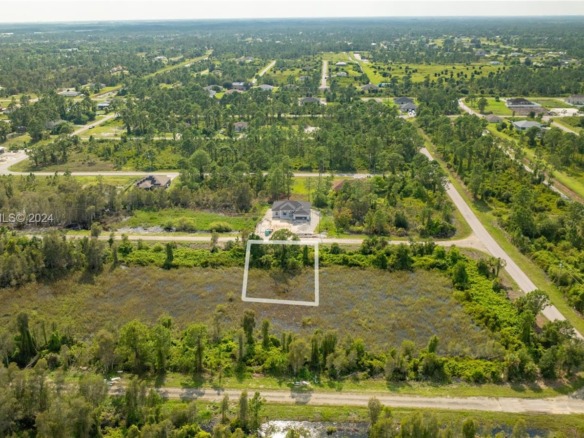 853 Belden Ave, Lehigh Acres FL 33936 — #A11494363