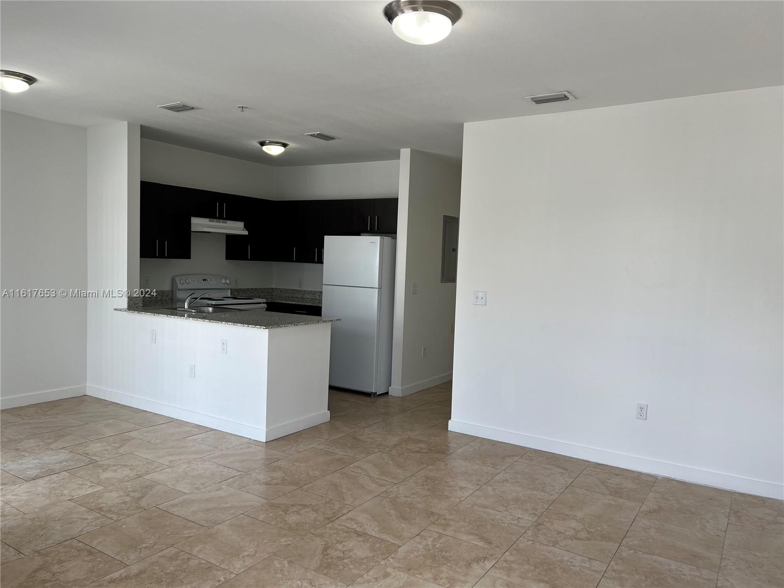 7945 W 2nd Ct # 102, Hialeah FL 33014 — #A11617653