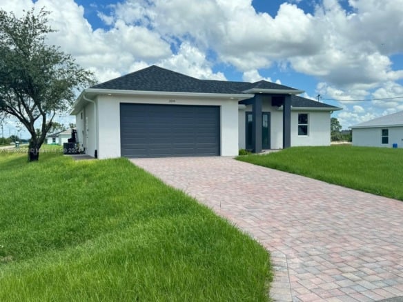 2044 Crawford Ave N, Lehigh Acres FL 33971 — #A11624293