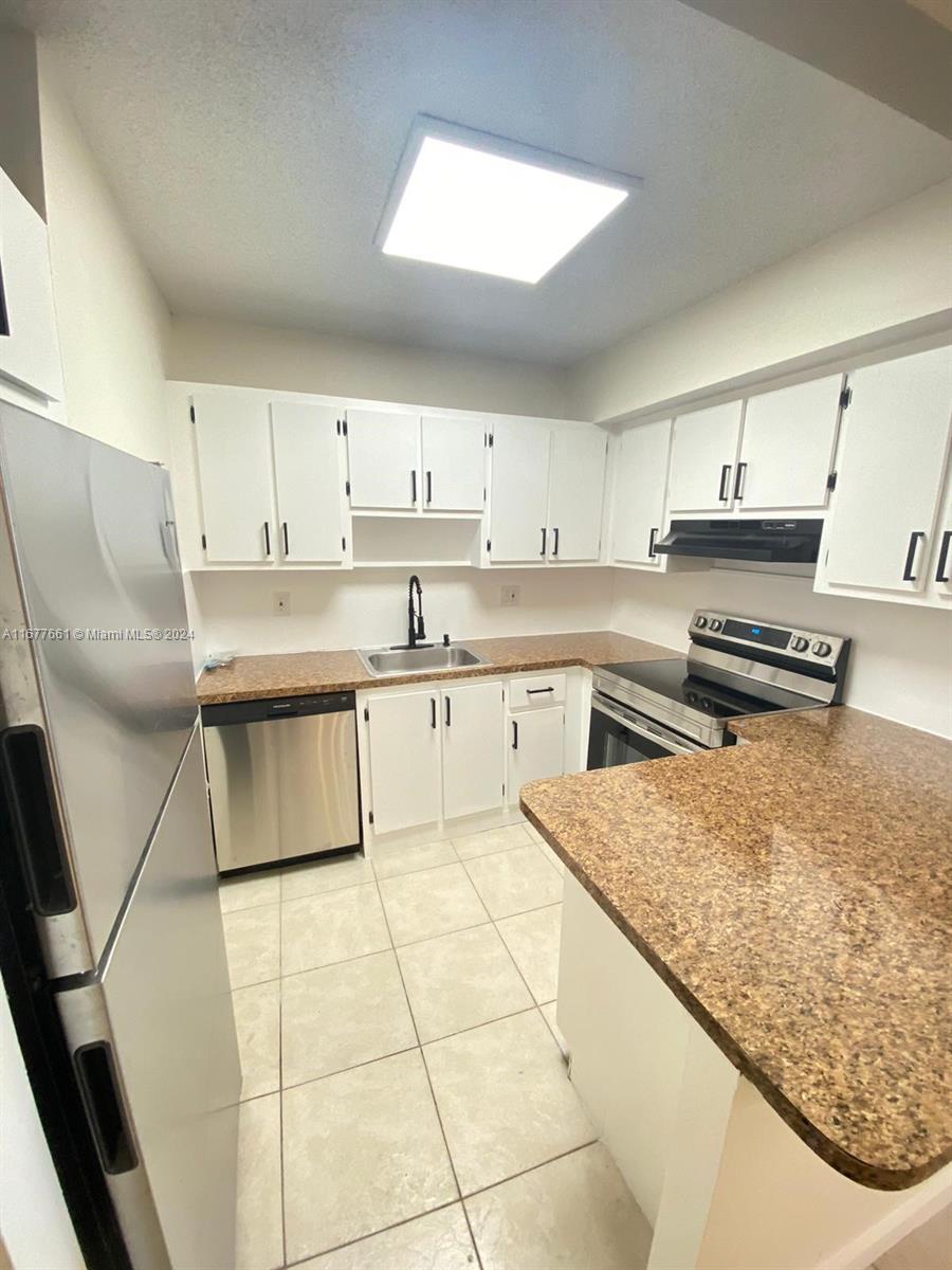 2029 NW 46th Ave # E308, Lauderhill FL 33313 — #A11677661