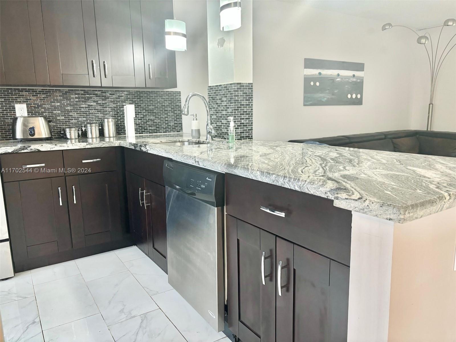 1ad5be0d-3900 1445 Atlantic Shores Blvd # 102, Hallandale Beach FL 33009 — #A11702544