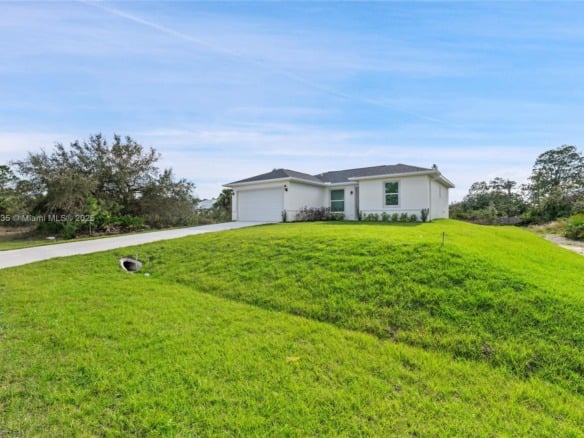 957 COMMODORE ST, Lehigh Acres FL 33974 — #A11715235