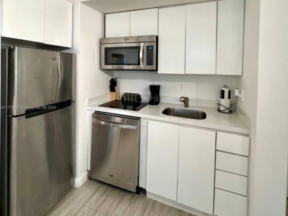 1611 Meridian Ave # 102, Miami Beach FL 33139 — #A11715490
