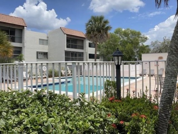 301 Racquet Club Rd # 201, Weston FL 33326 — #A11720113
