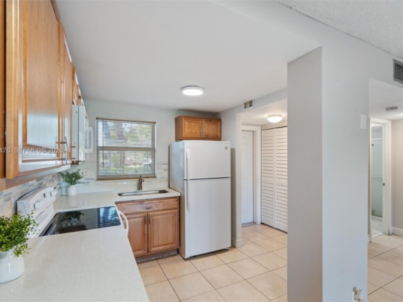 9761 Sunrise Lakes Blvd # 107, Sunrise FL 33322 — #A11739476