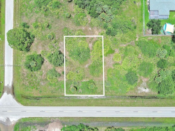841 Milwaukee Blvd, Lehigh Acres FL 33974 — #A11842386