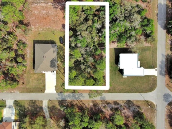 1702 Greenwood Ave, Lehigh Acres FL 33972 — #A11755748