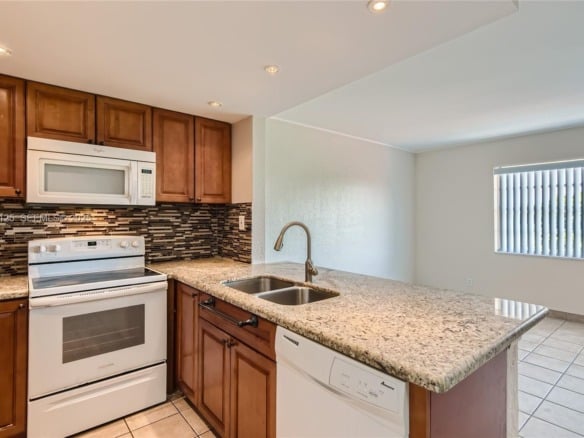 1855 Plunkett St # 406, Hollywood FL 33020 — #A11760125