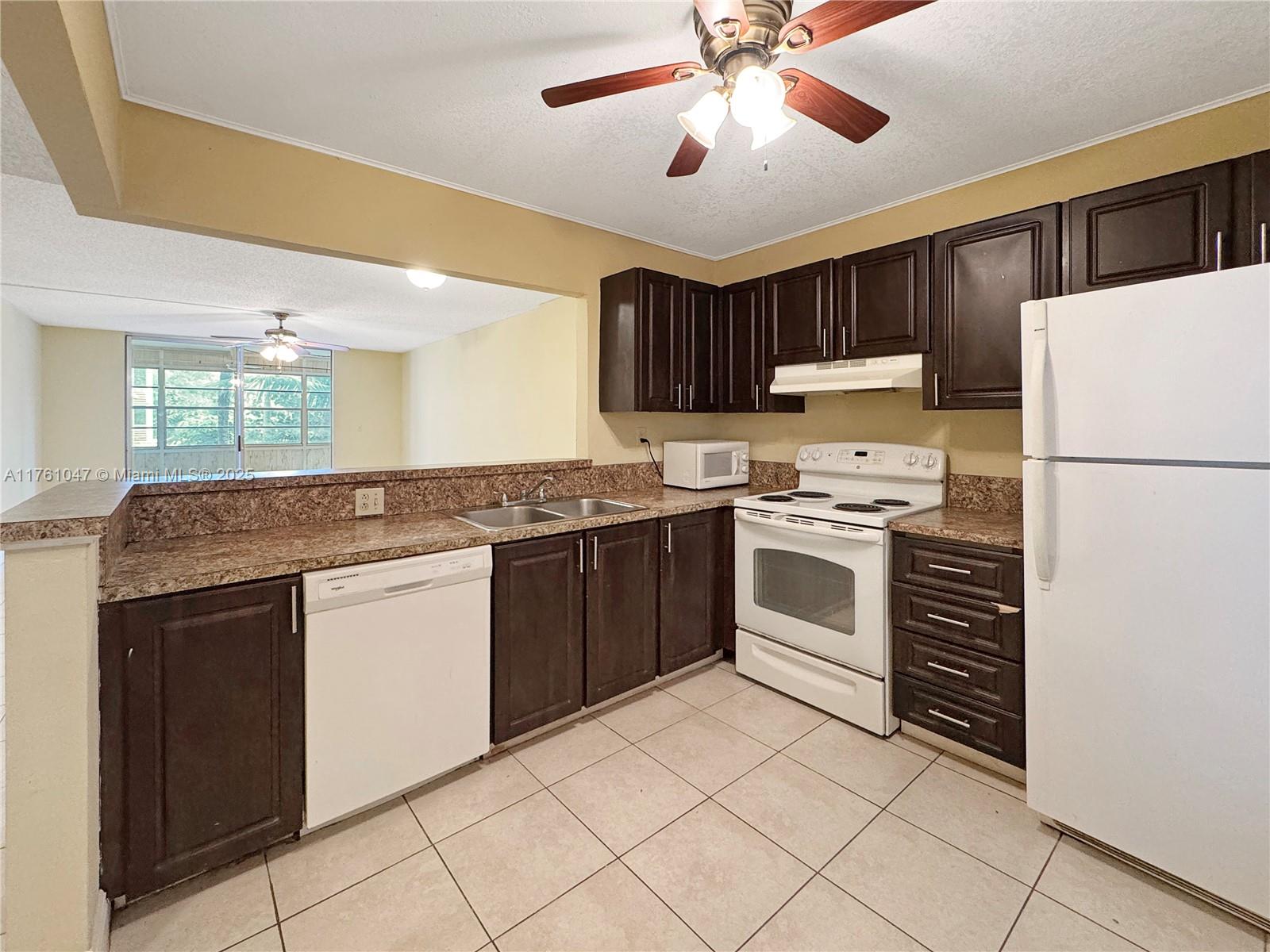 1ad5be0d-4657 410 NW 68th Ave # 207, Plantation FL 33317 — #A11761047