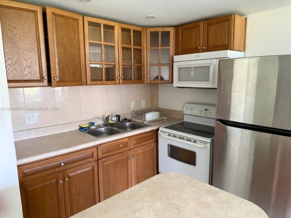 217 Suffolk F # 217, Boca Raton FL 33434 — #A11815060