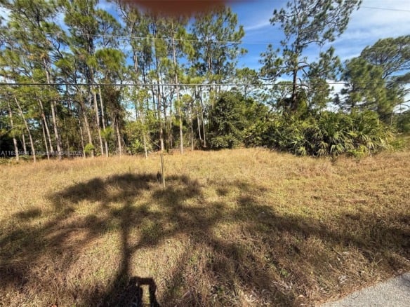 511 Addison St E, Lehigh Acres FL 33974 — #A11830484
