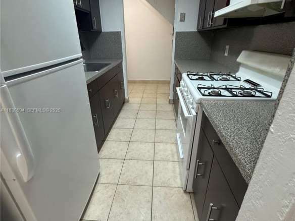 1305 W 53rd St # 406, Hialeah FL 33012 — #A11830594