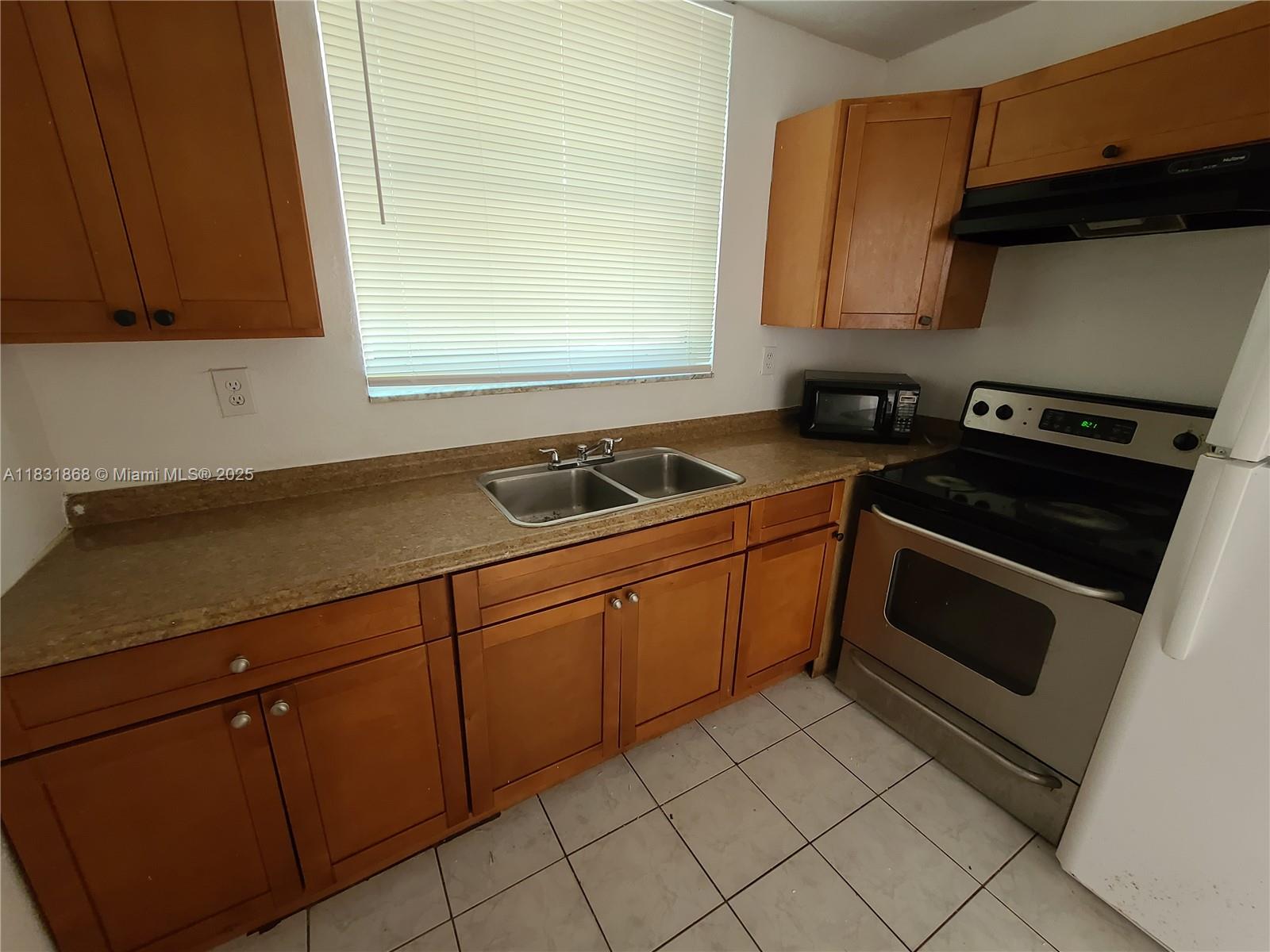 1ad5be0d-6127 1750 NW 55th Ave # 103, Lauderhill FL 33313 — #A11831868