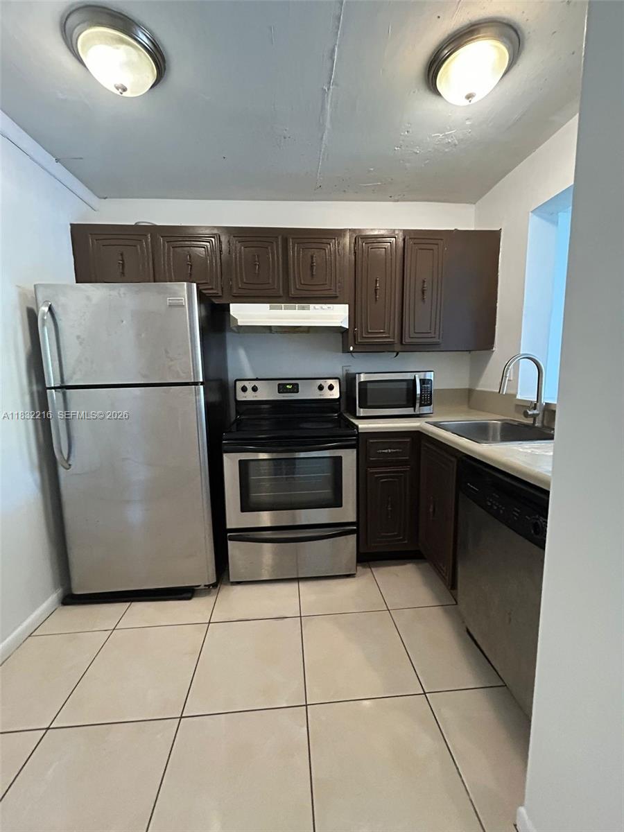 496 NW 165th St Rd # 310, Miami FL 33169 — #A11832216