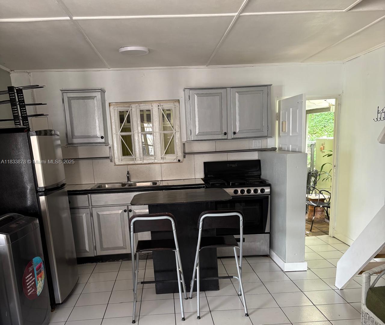 1ad5be0d-6183 00 Norbrook Loft Kingston, Jamaica # 2, FL — #A11833878