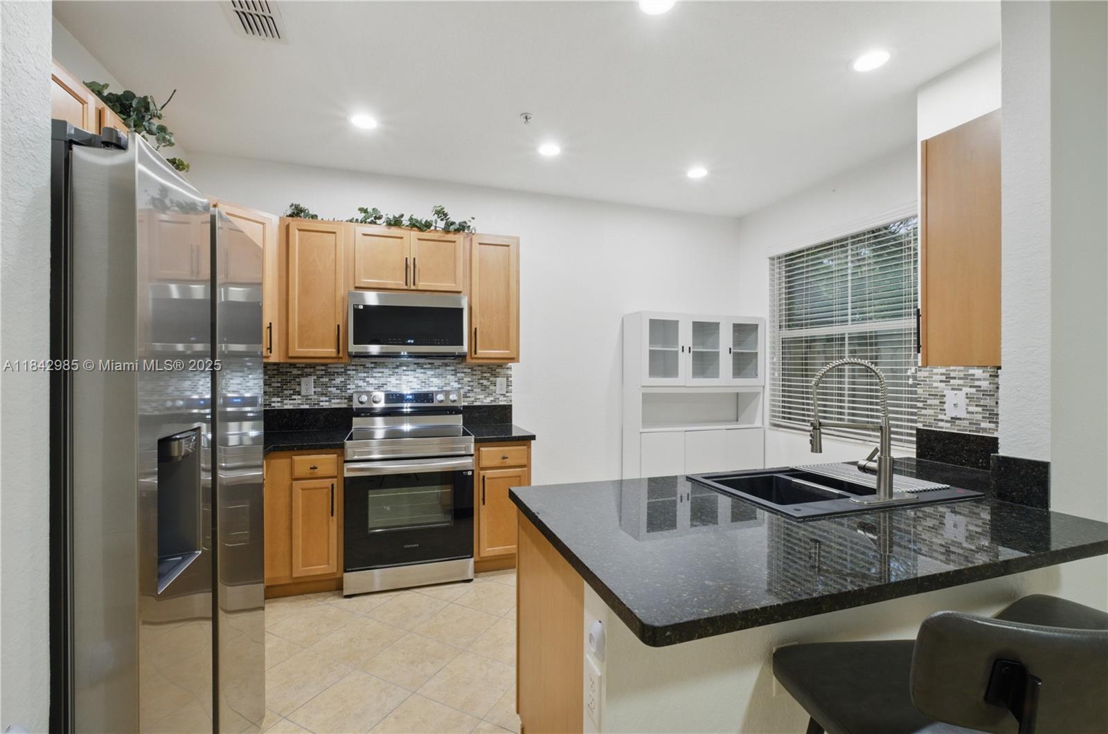 2851 W Prospect Rd # 307, Tamarac FL 33309 — #A11842985