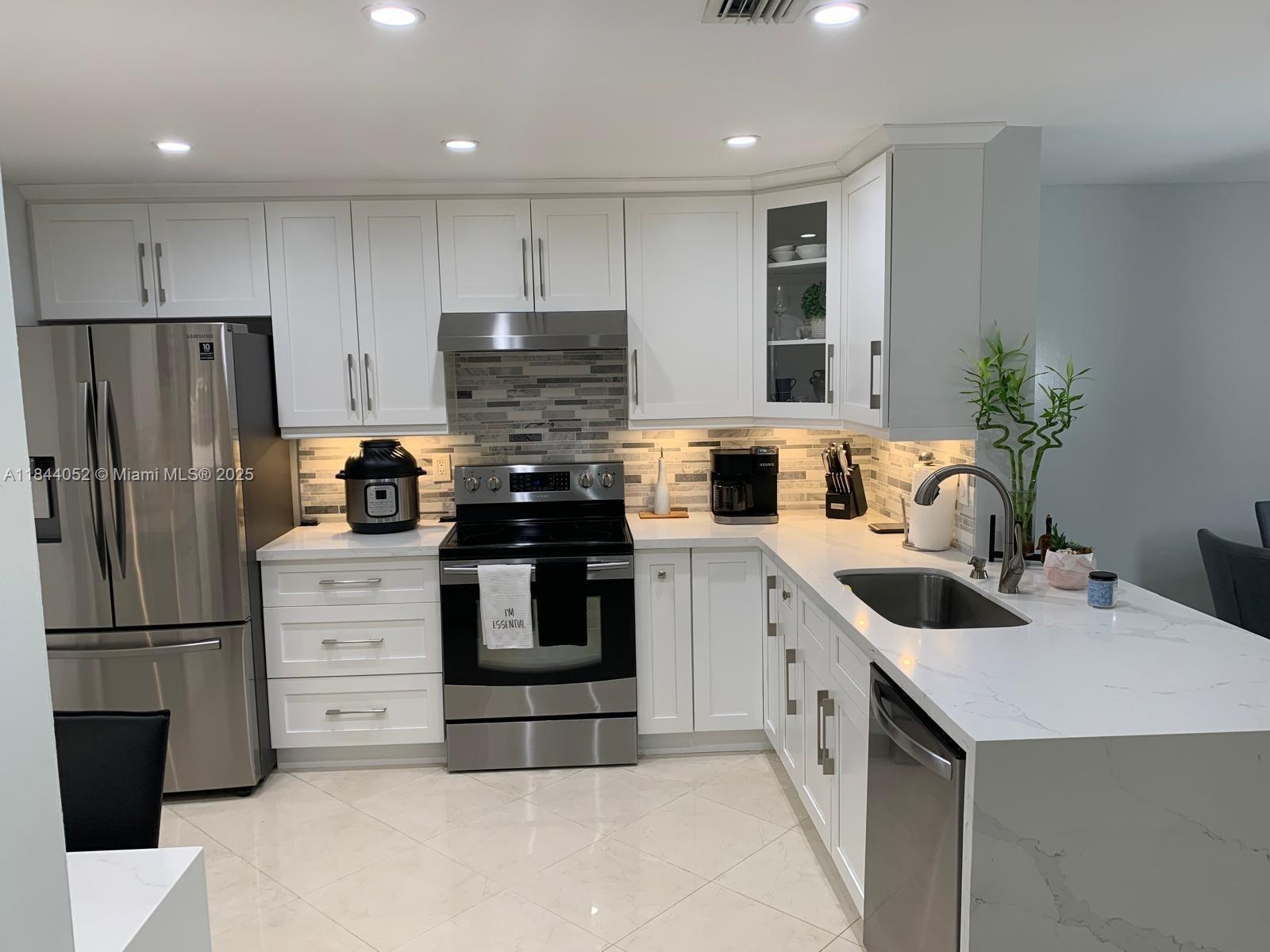 1051 Sorrento Dr, Weston FL 33326 — #A11844052