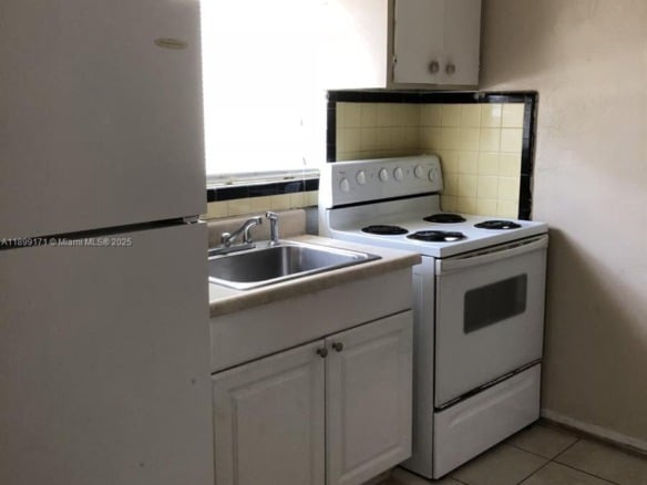 1915 Fletcher St # W2, Hollywood FL 33020 — #A11899171