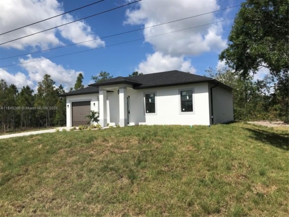919 Glenn Ave, Lehigh Acres FL 33972 — #A11845205