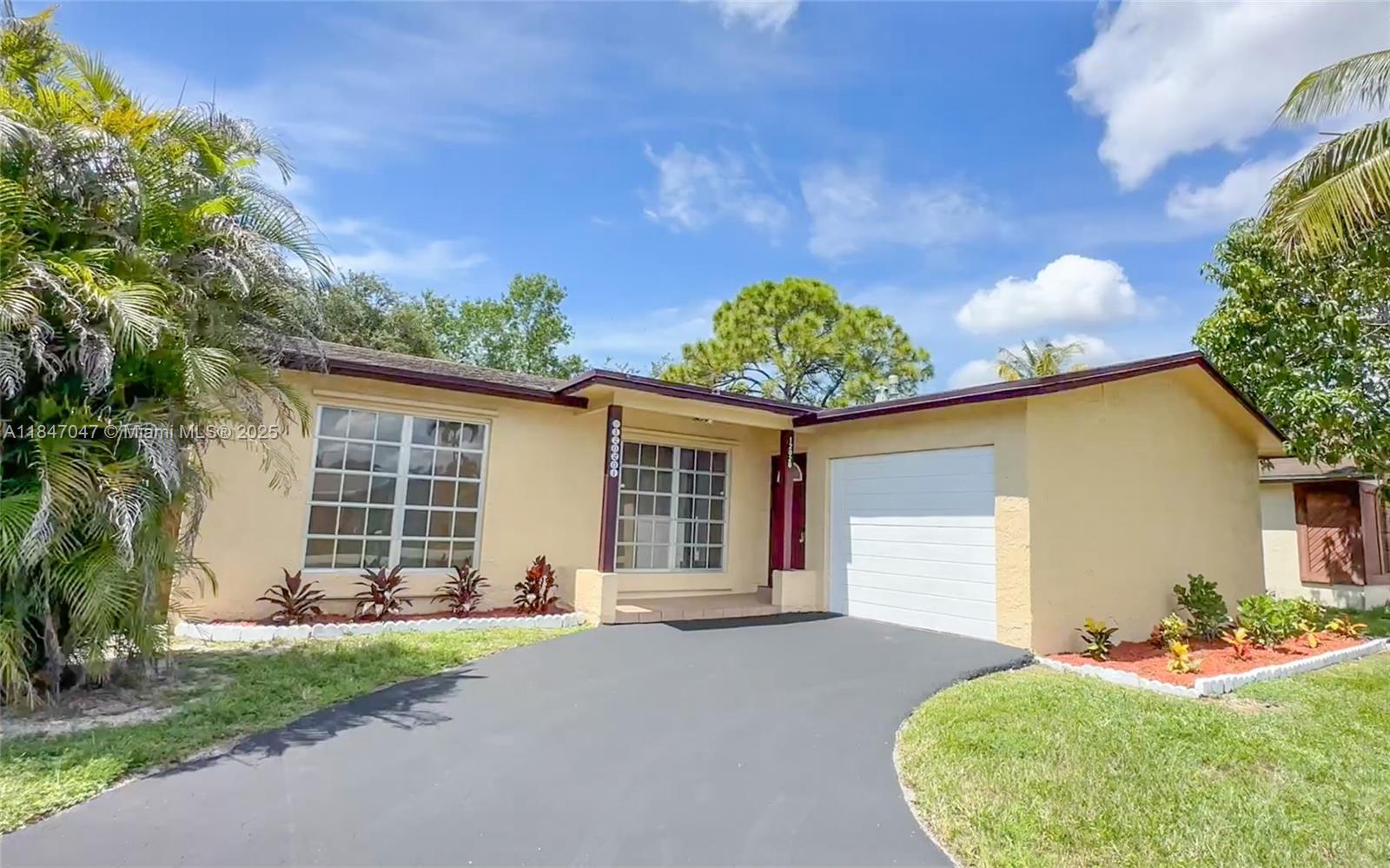 12020 NW 34th Pl, Sunrise FL 33323 — #A11847047