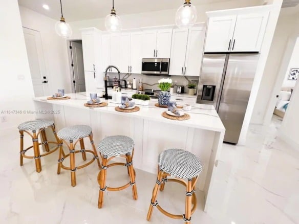 707 TROPICANA PKWY E, Cape Coral FL 33909 — #A11847346
