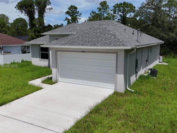 739 Sunrise Blvd, Lehigh Acres FL 33974 — #A11852668