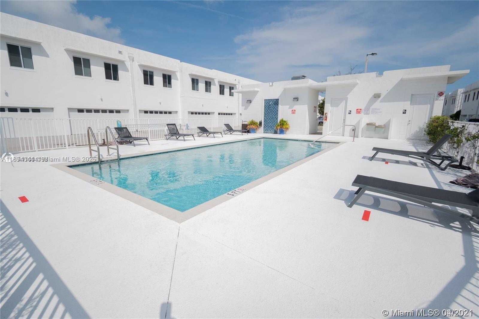 1ad5be0d-6890 2651 NE 212th Ter # 103, Miami FL 33180 — #A11854044