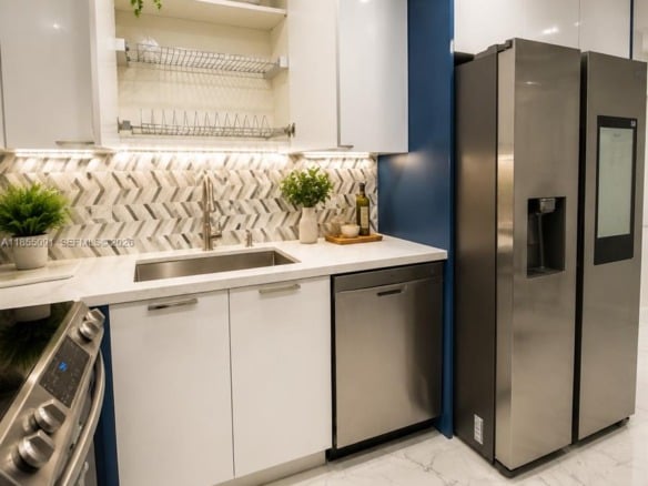 5005 Collins Ave # 822, Miami Beach FL 33140 — #A11855091