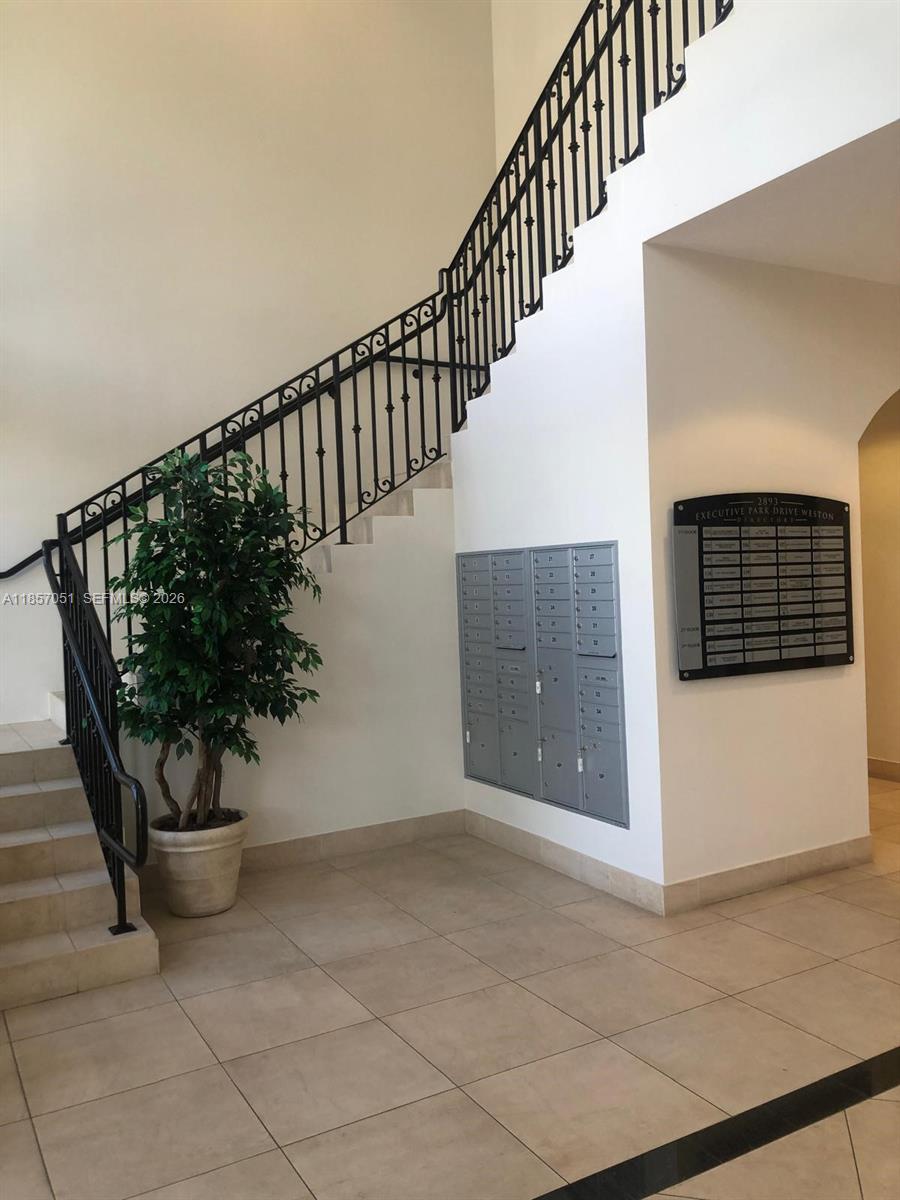 1ad5be0d-7009 2893 Executive Park Dr # 302, Weston FL 33331 — #A11857051