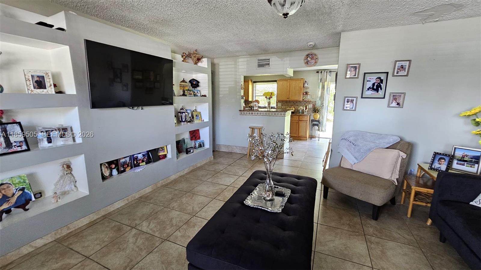 7501 Kimberly Blvd # 104, North Lauderdale FL 33068 — #A11859505