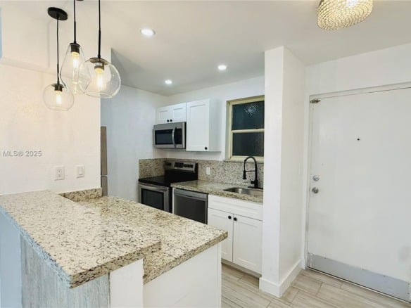 13101 Memorial Hwy # 104, North Miami FL 33161 — #A11870580