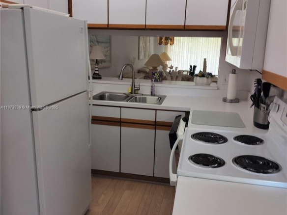 1002 Keystone Dr # F, Jupiter FL 33458 — #A11873939
