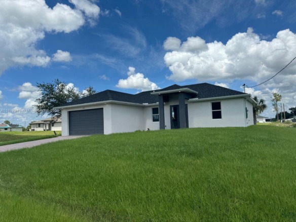 2044 Crawford Ave N, Lehigh Acres FL 33971 — #A11877943