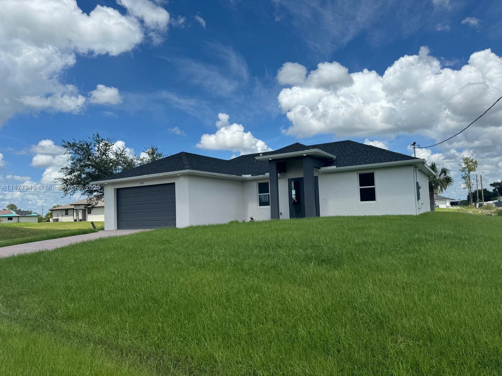 1ad5be0d-7970 2044 Crawford Ave N, Lehigh Acres FL 33971 — #A11877943