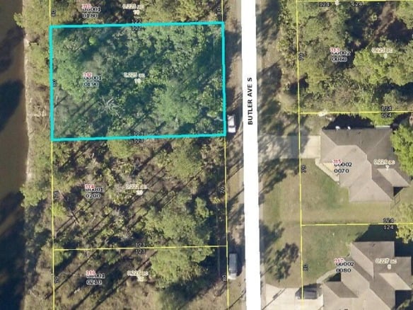 312 Butler Avenue S, Lehigh Acres FL 33974 — #R10832833