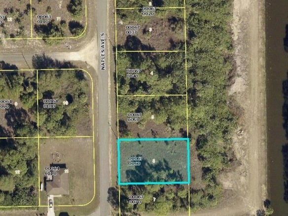611 Naples Avenue S, Lehigh Acres FL 33974 — #R10863952