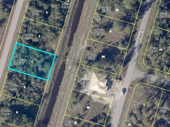 545 Osage Avenue S, Lehigh Acres FL 33974 — #R10900548