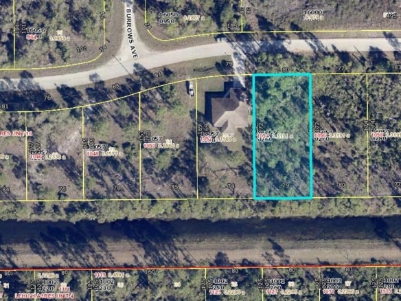1054 Candlelight Drive, Lehigh Acres FL 33974 — #R10909734