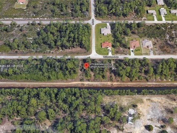 473 Willowbrook Dr, Lehigh Acres FL 33972 — #A11906222