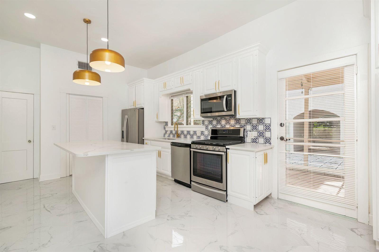 232 Rugby Road, West Palm Beach FL 33405 — #R10948134