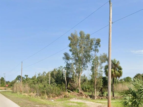 2807 W 24th Street W, Lehigh Acres FL 33971 — #R10993396
