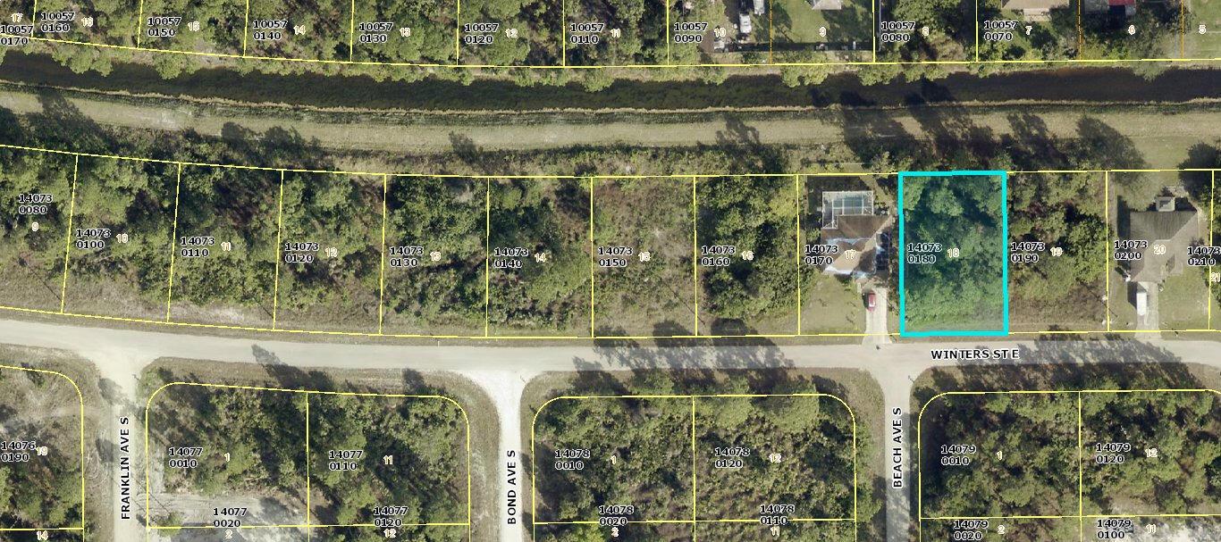 1047 Winters Street E, Lehigh Acres FL 33974 — #R11000054